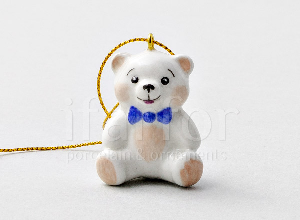 Christmas tree toy Teddy bear with a blue bow