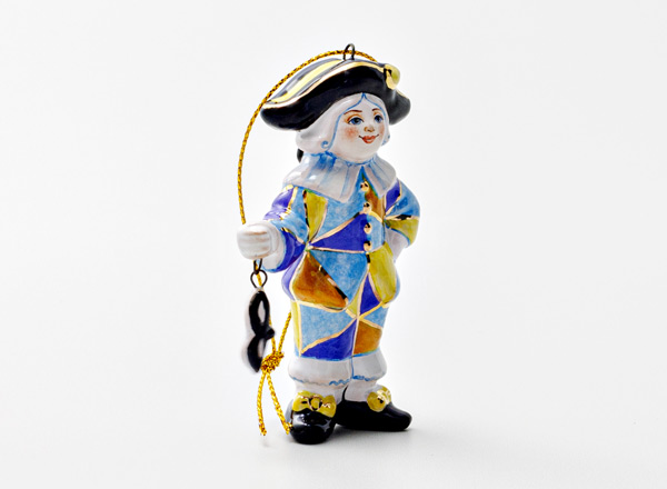 Christmas tree toy Golden Key. Harlequin with a mask