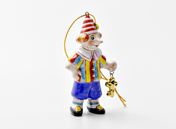 Christmas tree toy Golden Key. Pinocchio with a key