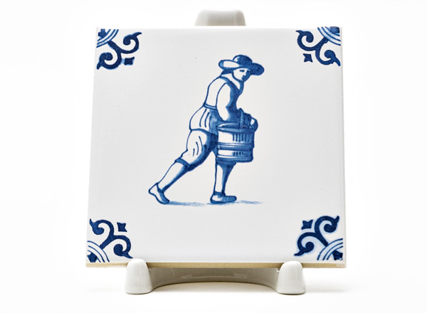 Tile Dutch. Man with a bucket 