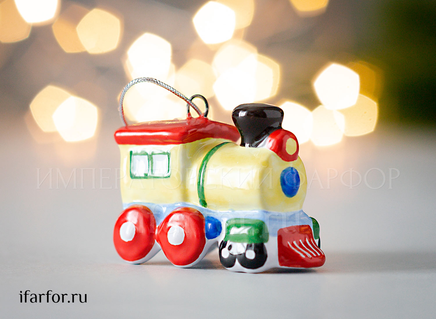 Елочная игрушка «Паровоз» Форма: Паровоз. Майолика. 30 мм.