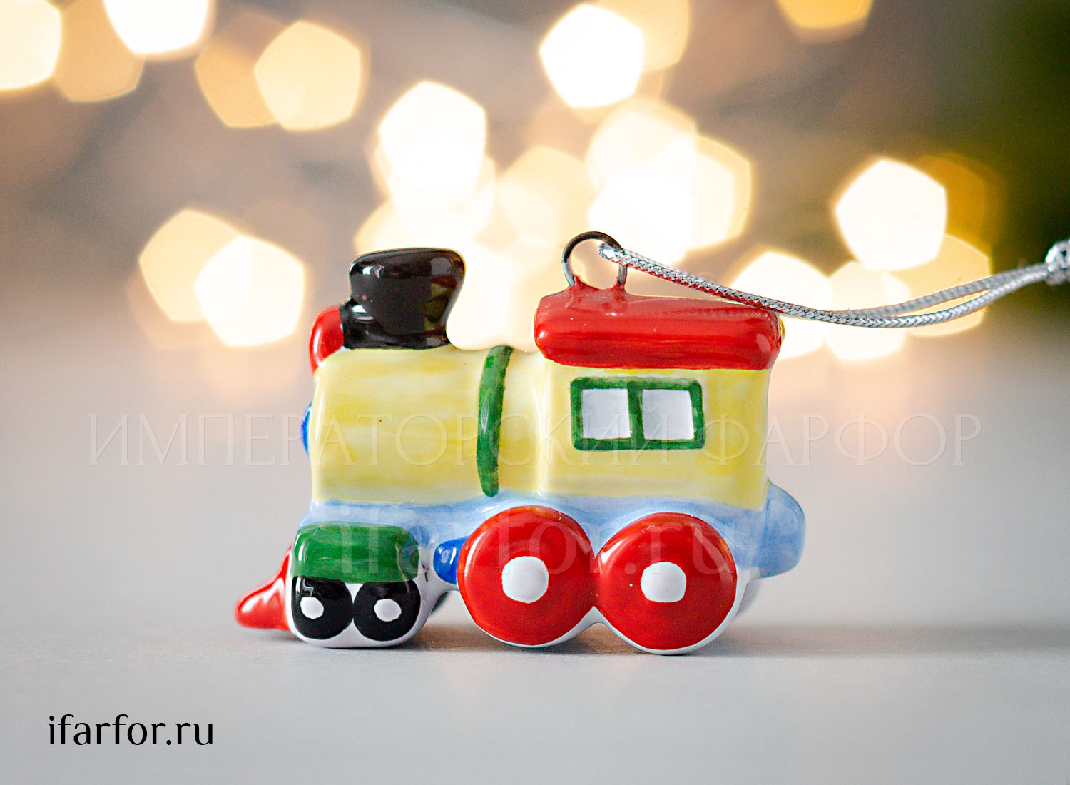 Елочная игрушка «Паровоз» Форма: Паровоз. Майолика. 30 мм.