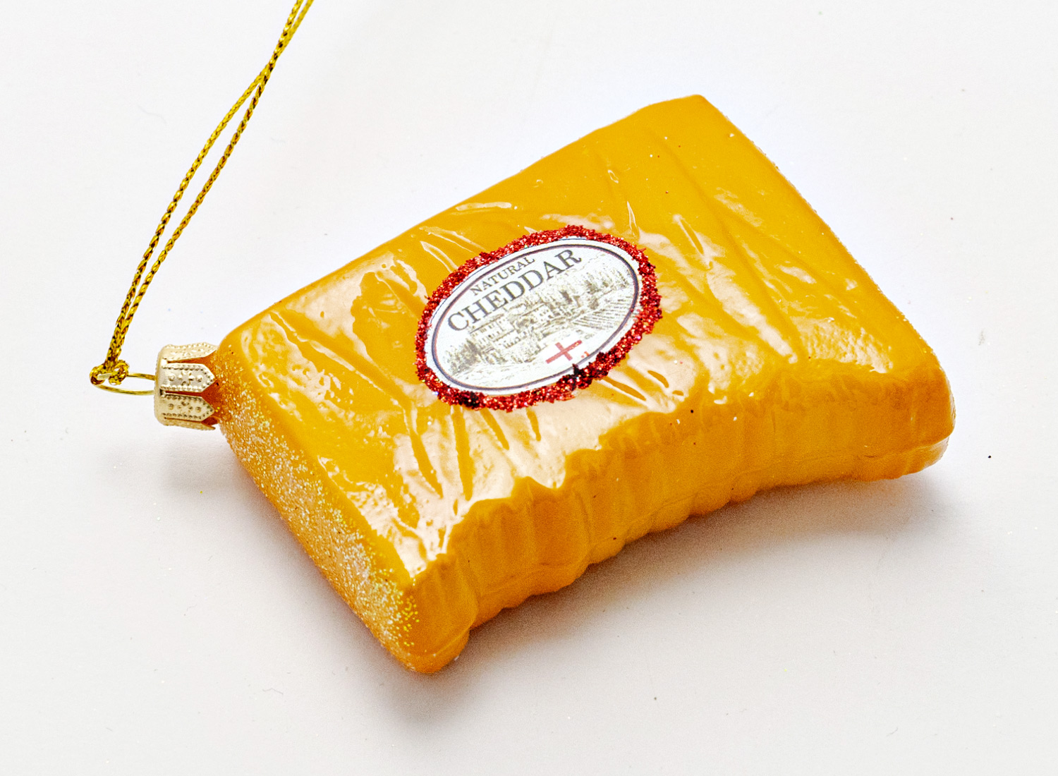 Елочная игрушка «Сыр Cheddar» Стекло. 65 x 85 мм.