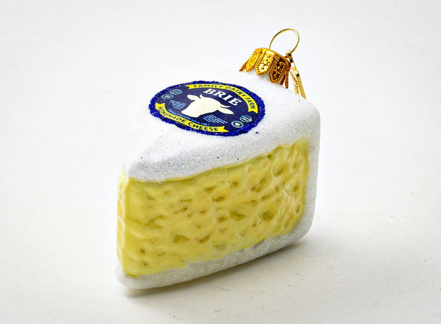 Елочная игрушка «Сыр Brie» Стекло. 75 x 50 мм.