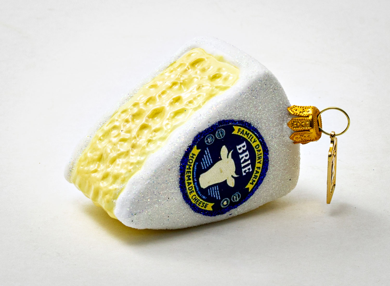 Елочная игрушка «Сыр Brie» Стекло. 75 x 50 мм.