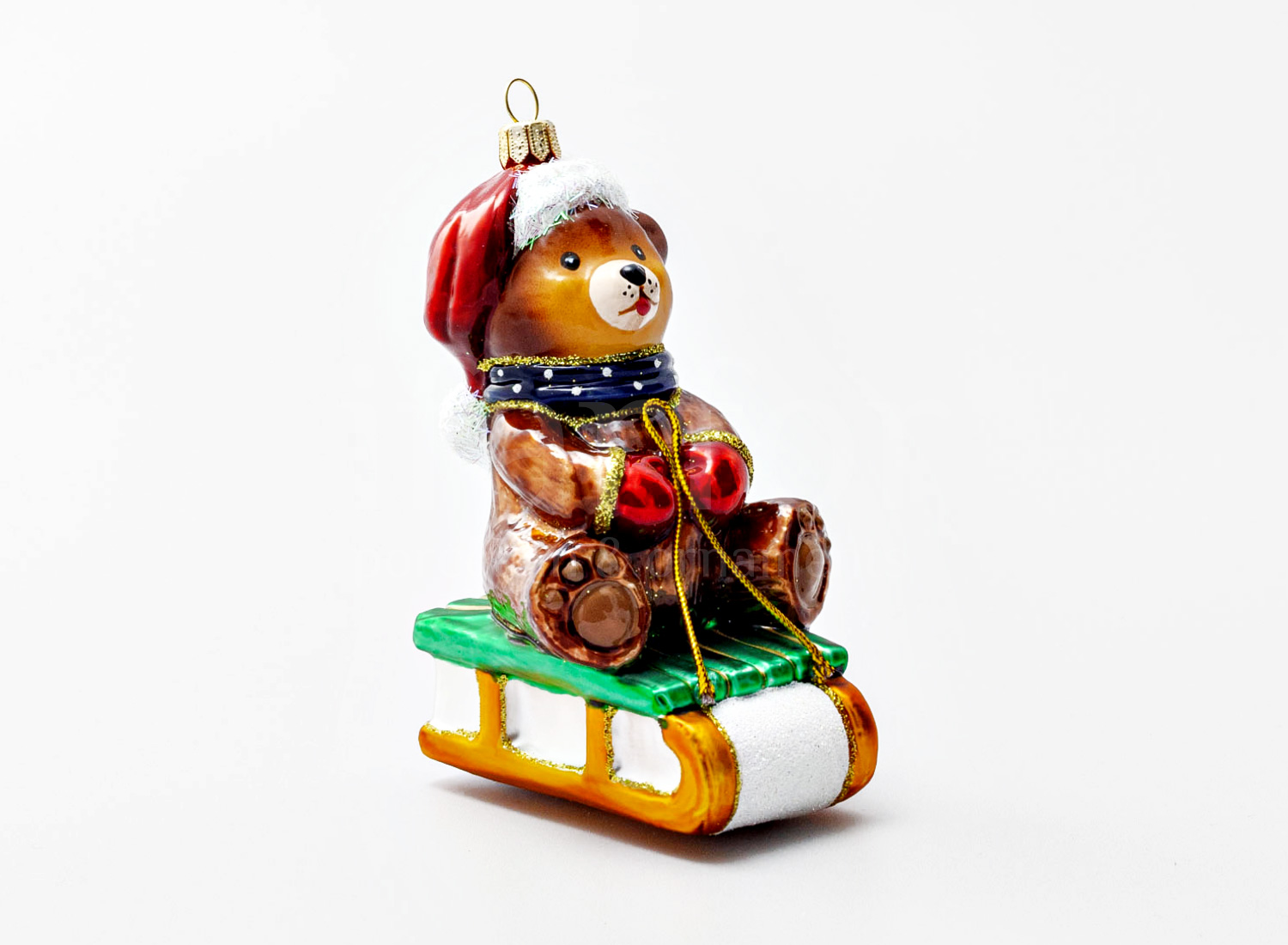 Елочная игрушка «Мишка Тедди на санках» Стекло. 75 x 120 мм.
