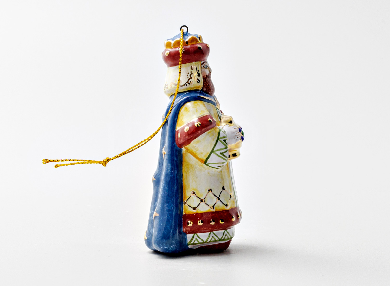 Елочная игрушка «Волхв Мельхиор» Форма: Волхв Мельхиор. Майолика. 54 x 95 мм.