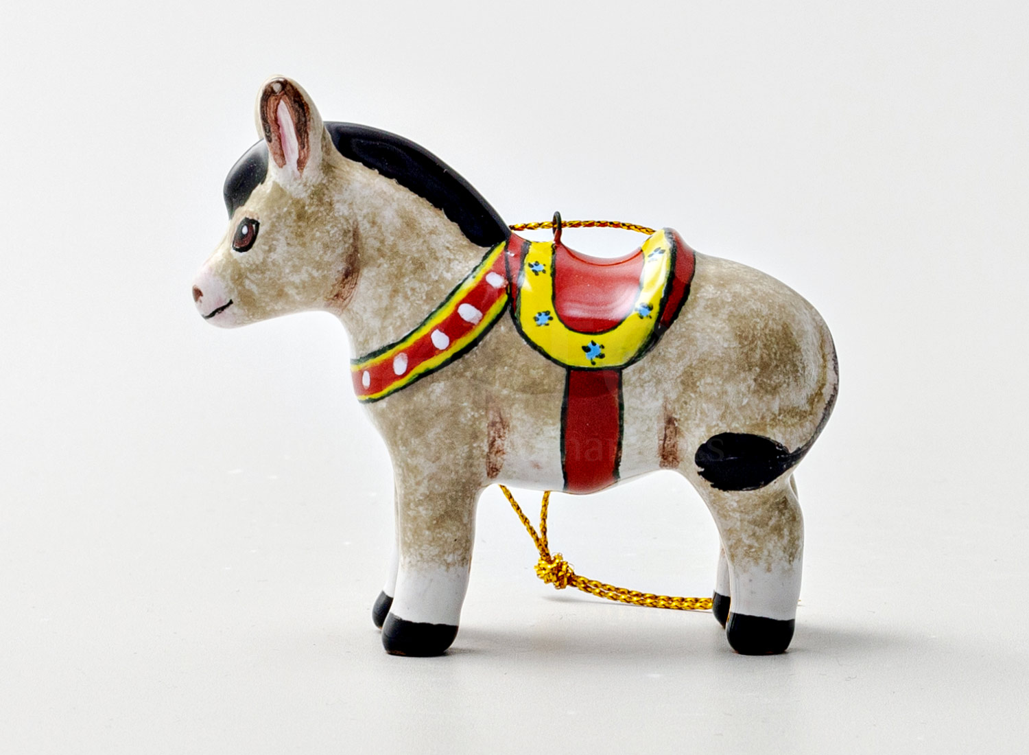Елочная игрушка «Ослик» Форма: Ослик. Майолика. 75 x 68 мм.
