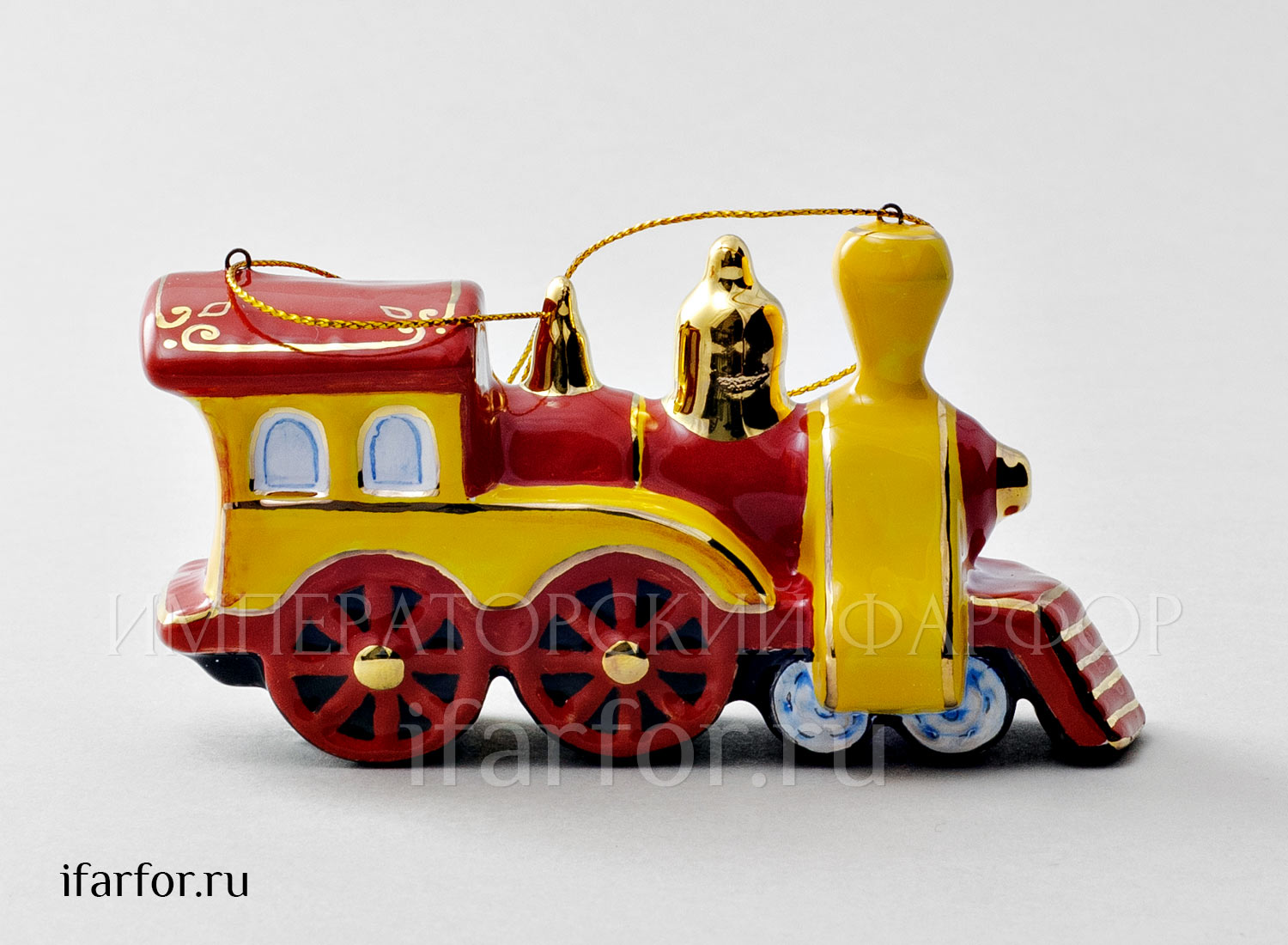 Елочная игрушка «Паровозик» Форма: Паровозик. Майолика. 120 x 70 мм.