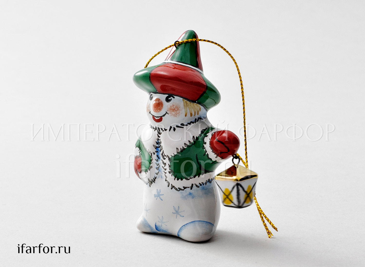 Елочная игрушка «Снеговик с фонариком» Форма: Снеговик с фонариком. Майолика. 35 x 53 x 82 мм.