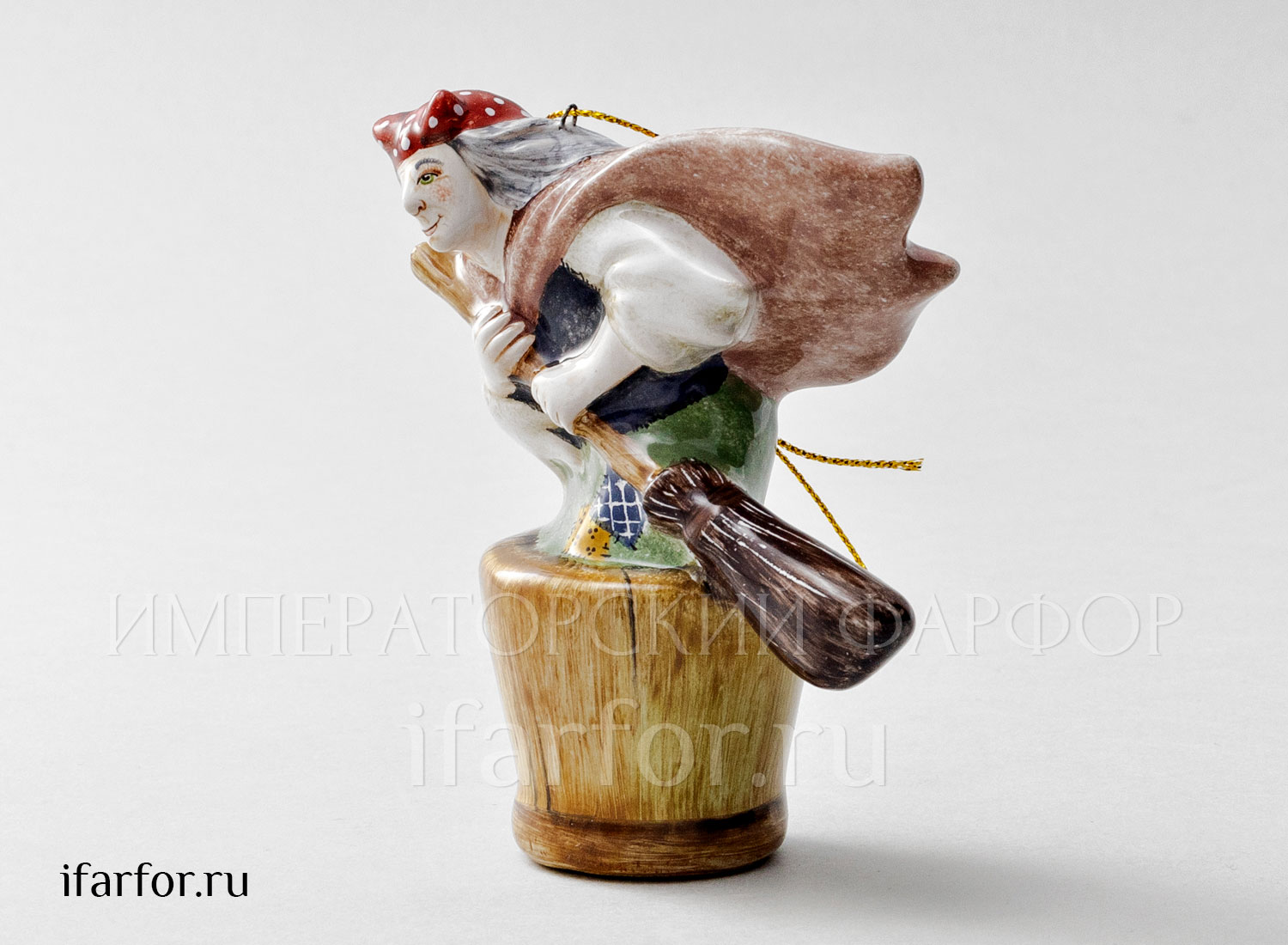 Елочная игрушка «Баба-Яга» Форма: Баба-Яга. Майолика. 85 x 100 мм.