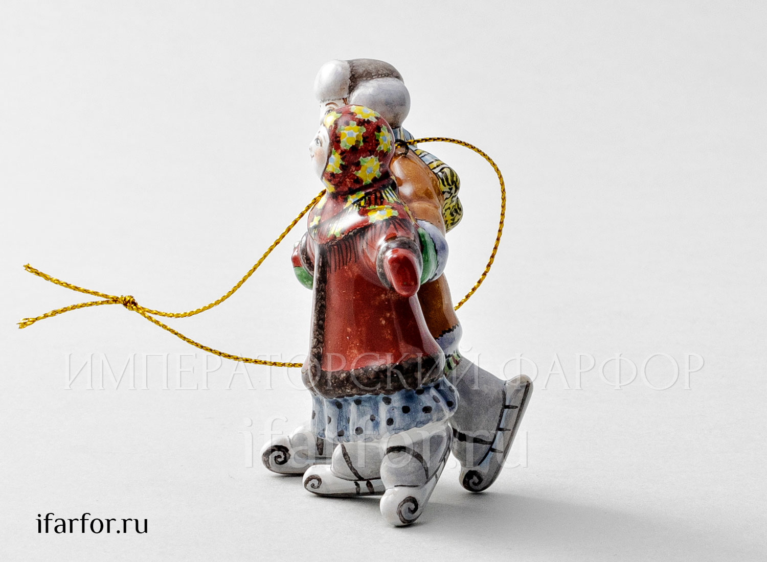Елочная игрушка «Дети на коньках» Форма: Дети на коньках. Майолика. 75 x 85 мм.