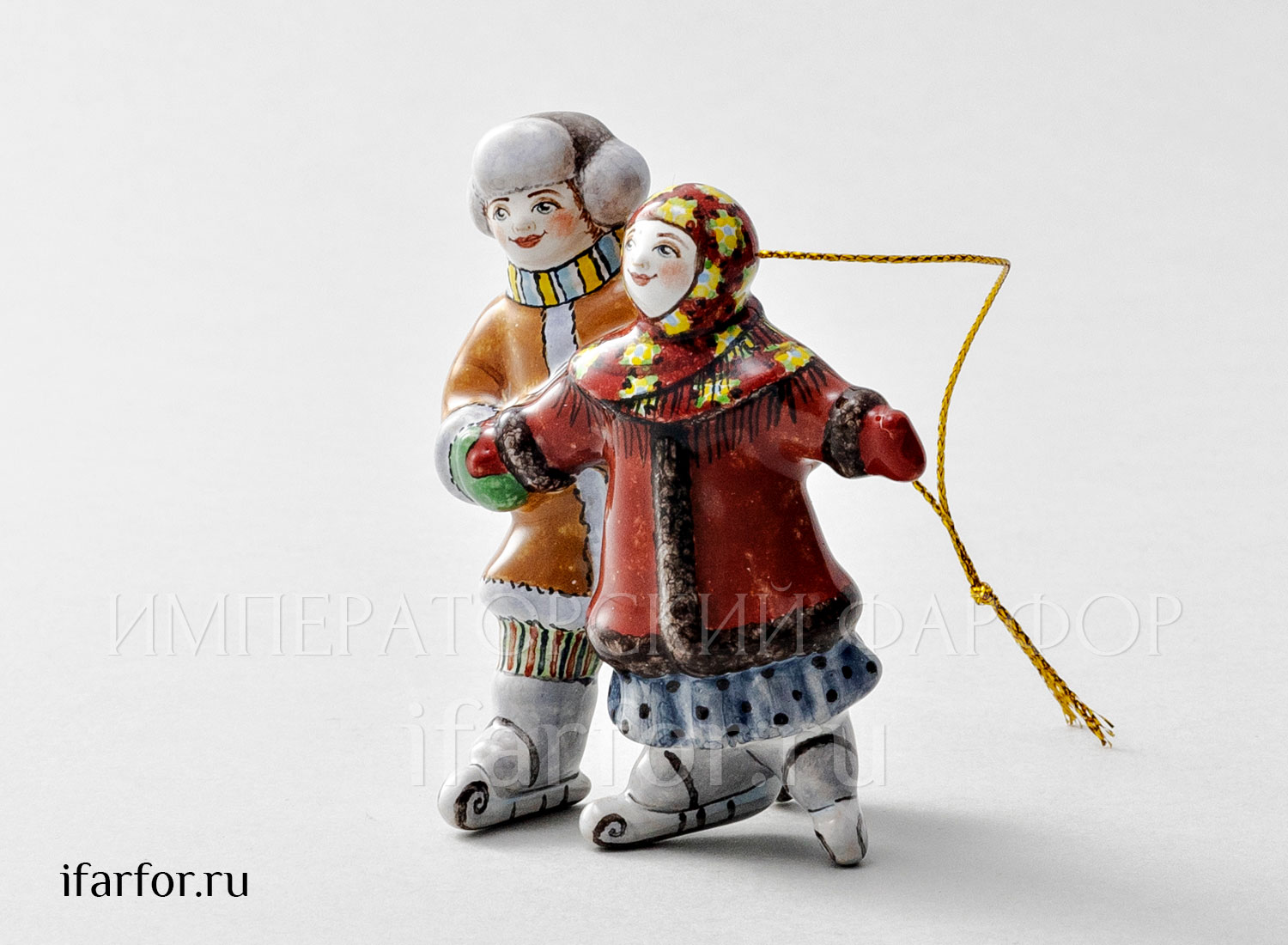 Елочная игрушка «Дети на коньках» Форма: Дети на коньках. Майолика. 75 x 85 мм.