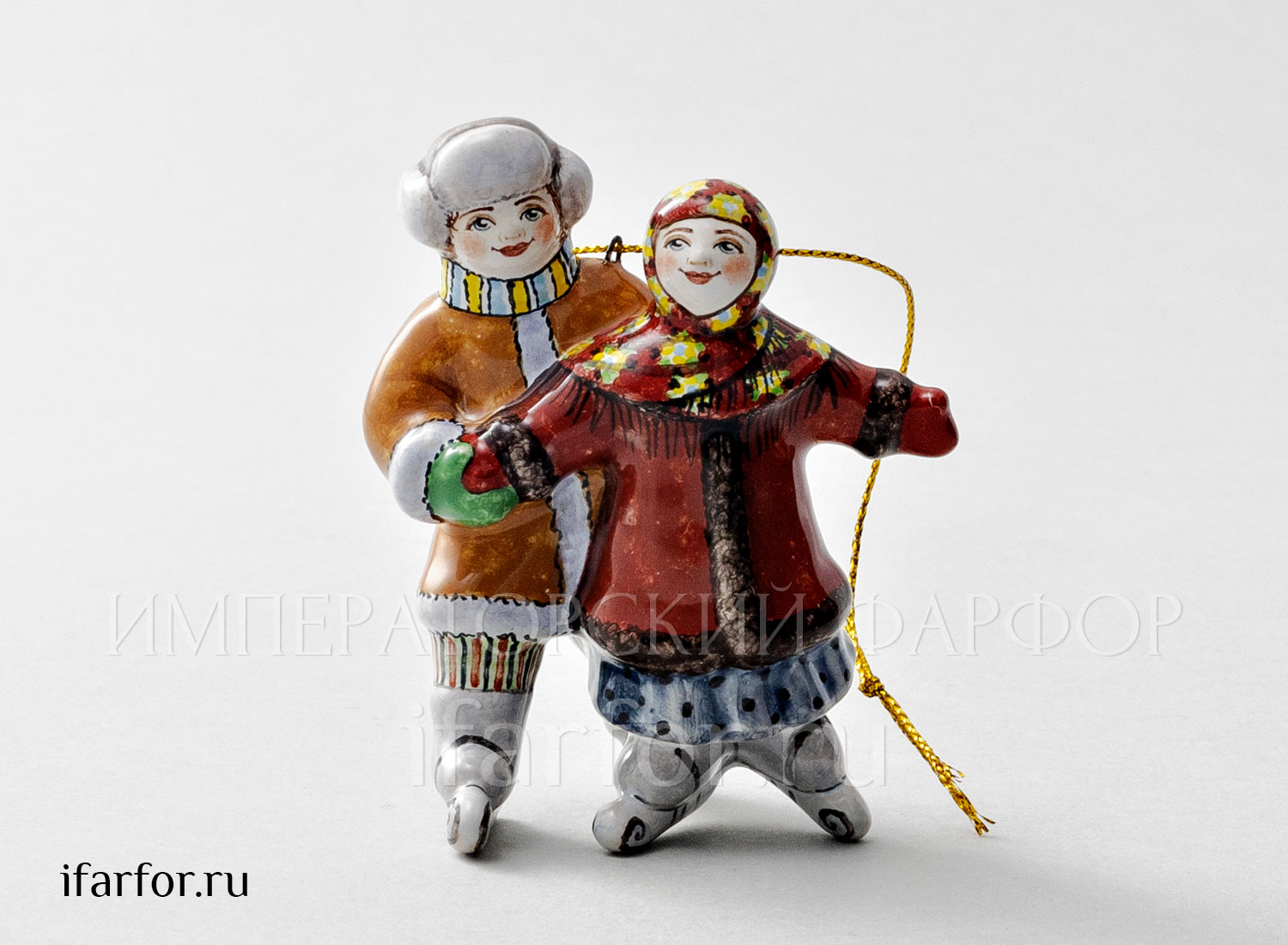 Елочная игрушка «Дети на коньках» Форма: Дети на коньках. Майолика. 75 x 85 мм.