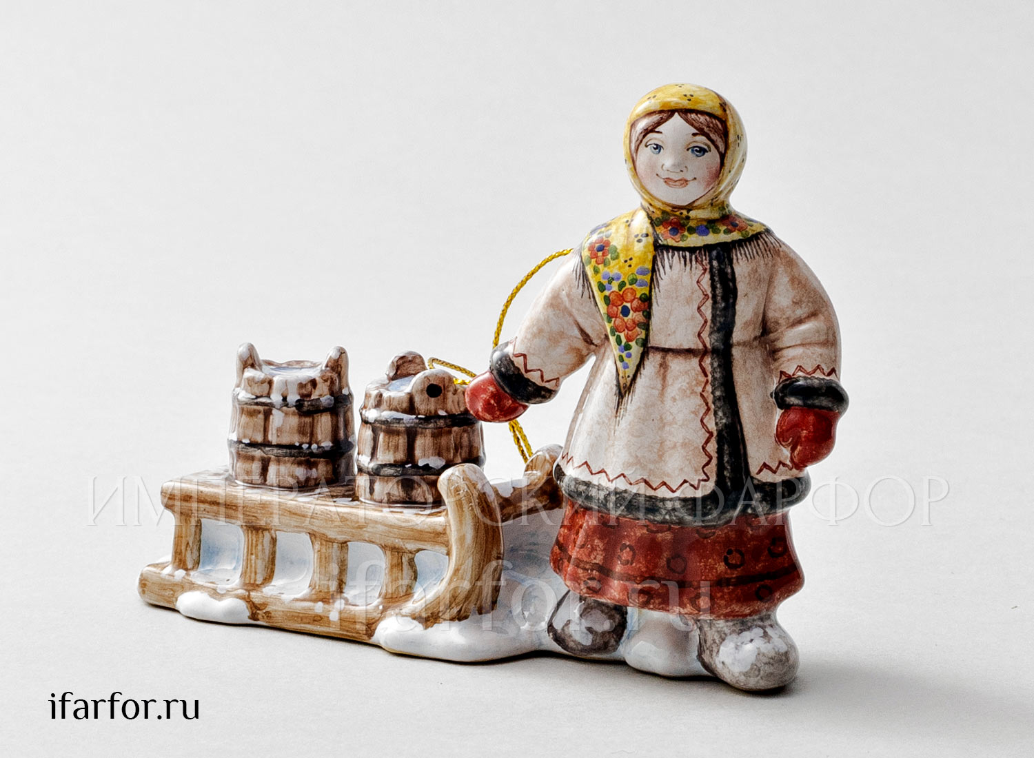 Елочная игрушка «Крестьянка с санками» Форма: Крестьянка с санками. Майолика. 120 x 85 мм.