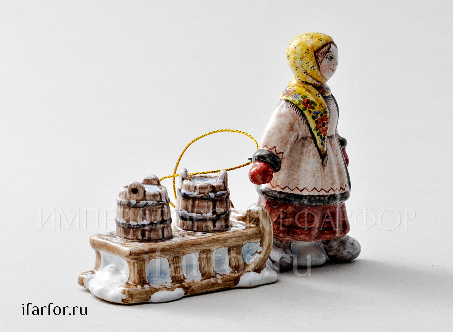 Елочная игрушка «Крестьянка с санками» Форма: Крестьянка с санками. Майолика. 120 x 85 мм.