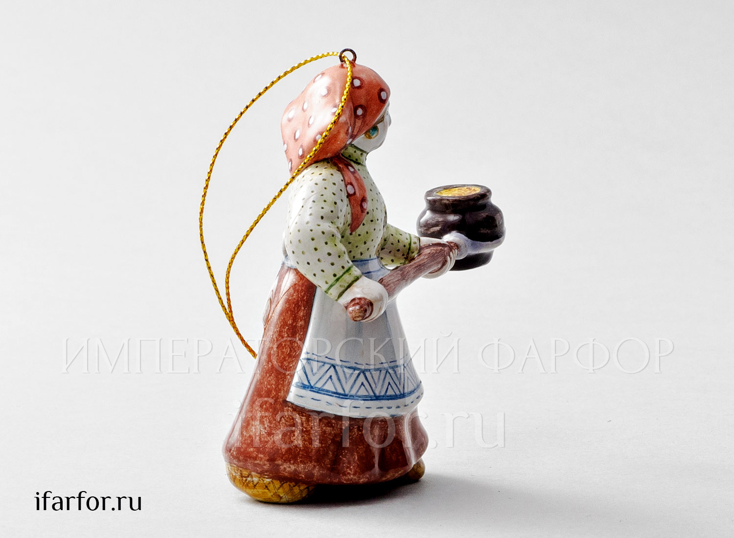 Елочная игрушка «Хозяюшка с ухватом» Форма: Хозяюшка с ухватом. Майолика. 90 x 95 мм.