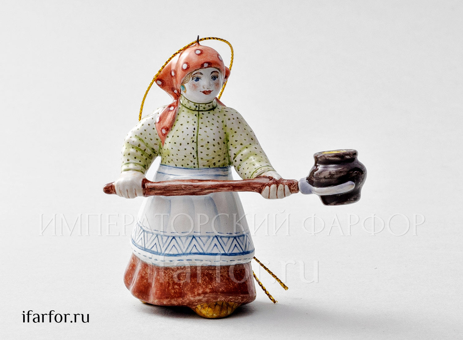 Елочная игрушка «Хозяюшка с ухватом» Форма: Хозяюшка с ухватом. Майолика. 90 x 95 мм.
