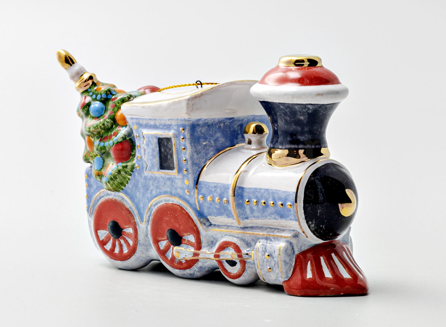 Елочная игрушка «Голубой вагон» Форма: Голубой вагон. Майолика. 125 x 90 мм.