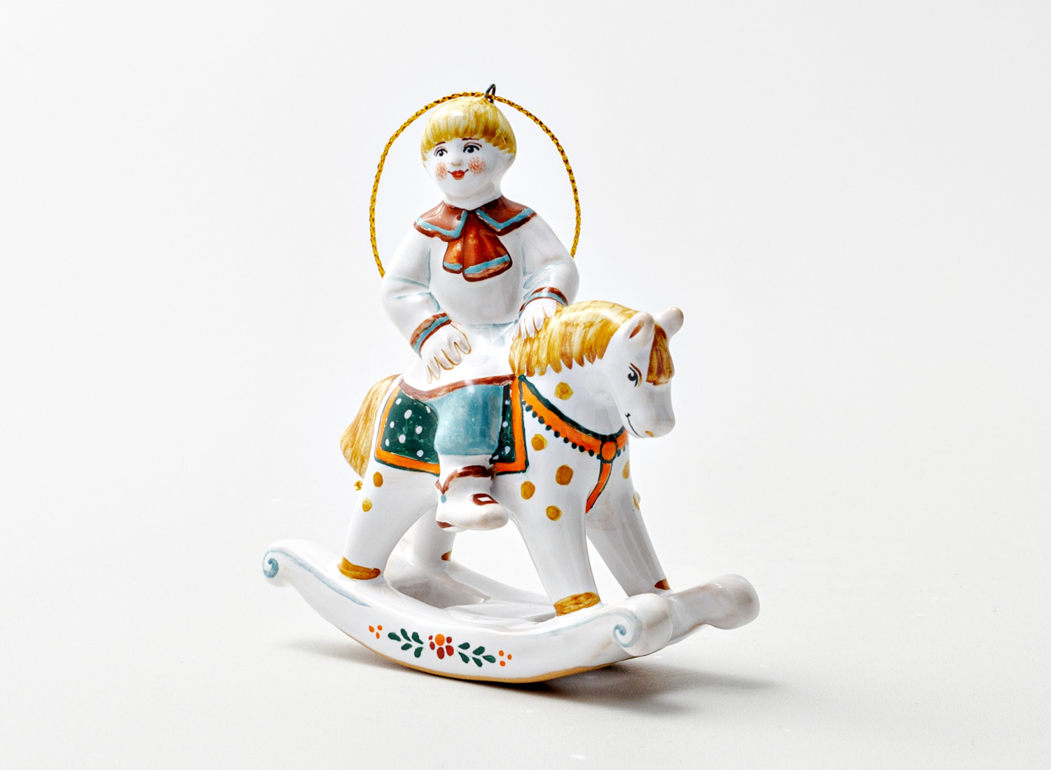 Елочная игрушка «Мальчик на лошадке» Форма: Мальчик на лошадке. Майолика. 85 x 95 мм.
