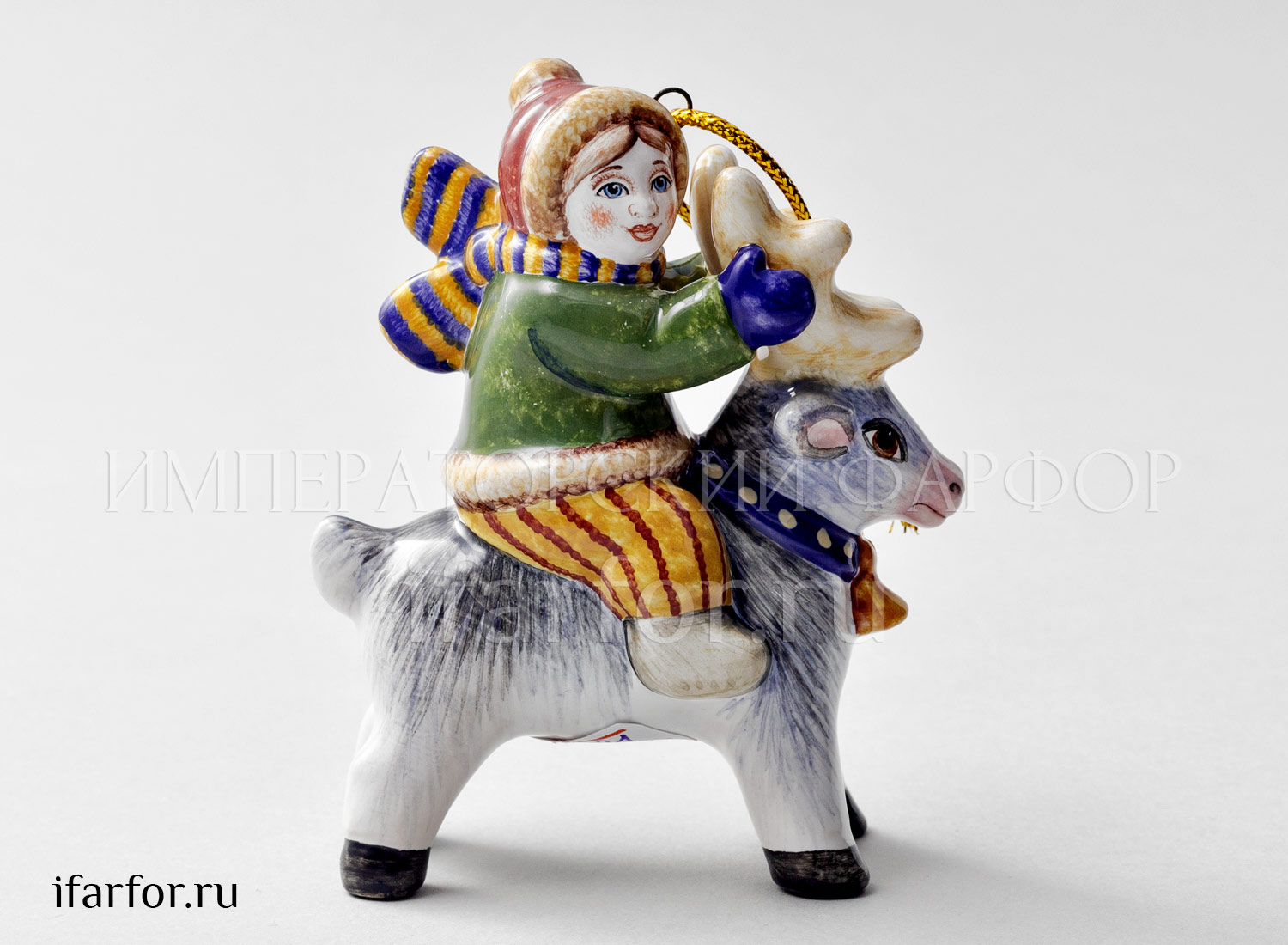 Елочная игрушка «Мальчик с шарфиком на олене» Форма: Мальчик с шарфиком на олене. Майолика. 80 x 90 мм.