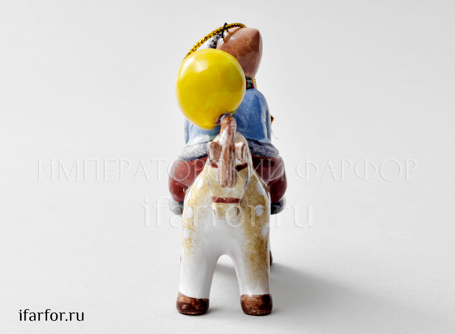 Елочная игрушка «Мальчик с шариком на лошадке» Форма: Мальчик с шариком на лошадке. Майолика. 80 x 90 мм.
