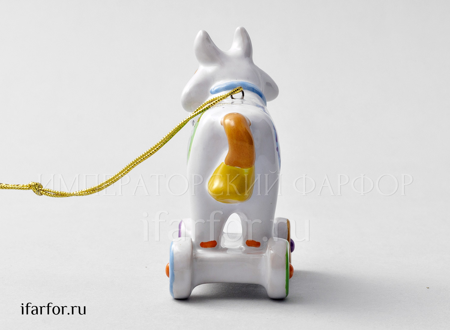 Елочная игрушка «Бычок на колесиках» Форма: Бычок на колесиках. Майолика. 75 x 75 мм.