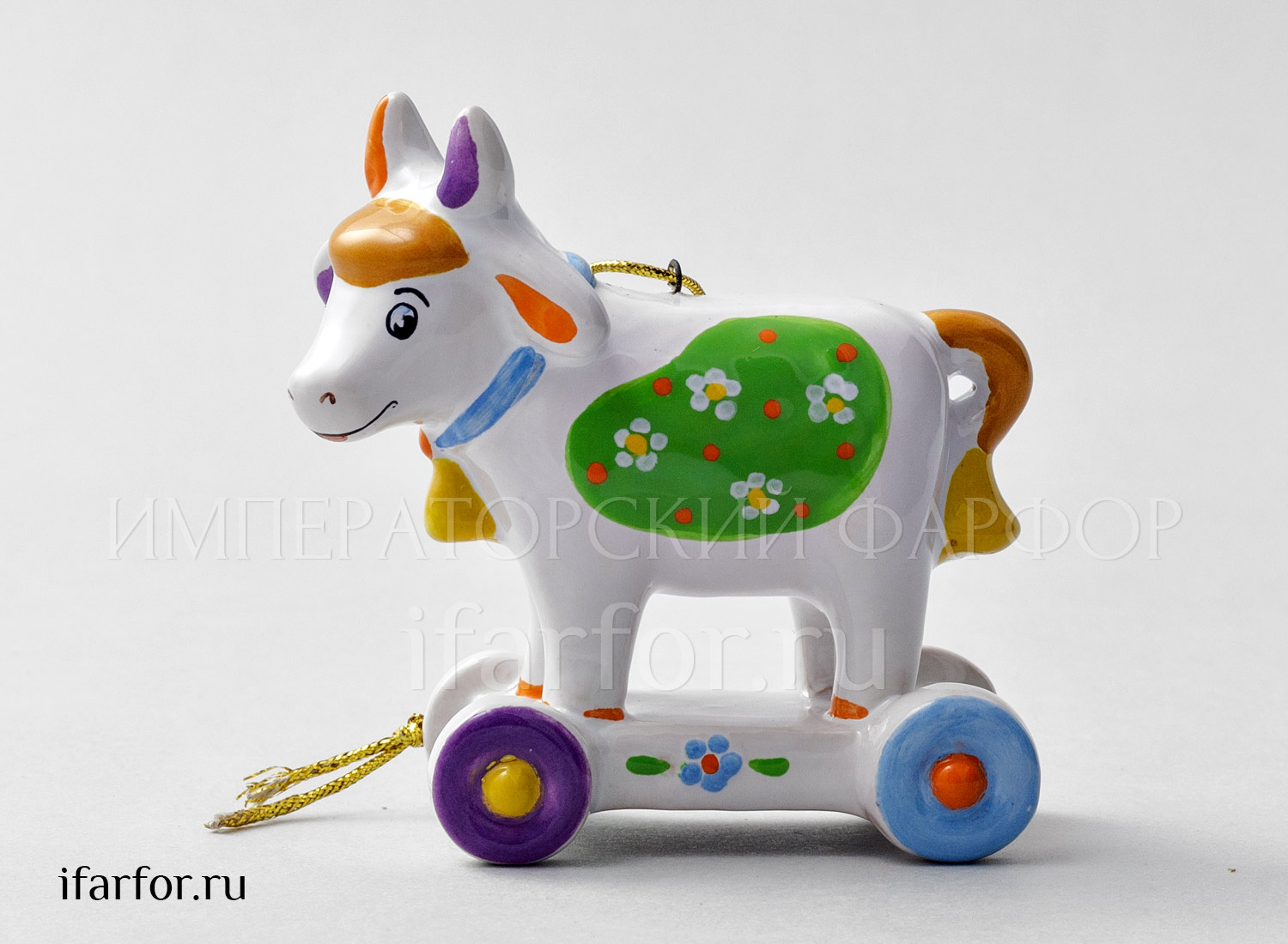 Елочная игрушка «Бычок на колесиках» Форма: Бычок на колесиках. Майолика. 75 x 75 мм.