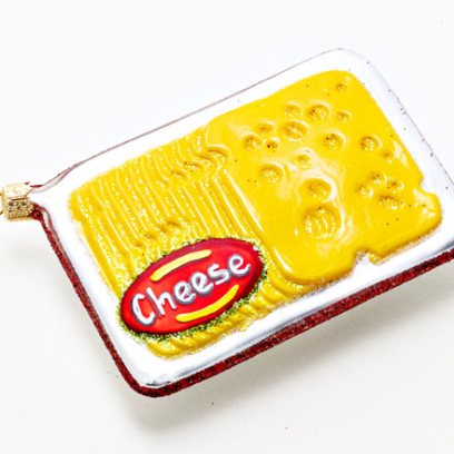 Елочная игрушка «Упаковка с сыром» Стекло. 65 x 100 мм.